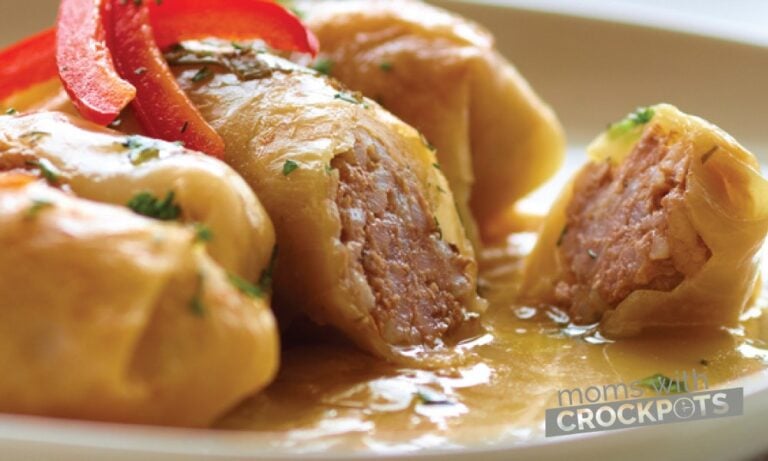 A classic home cooked recipe that is make even better in the slow cooker! You have to try this tasty Crockpot cabbage rolls recipe!